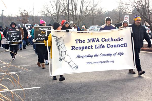 Catholic pro-life supporters bundle up Jan. 22 for the first Respect Life March in Fayetteville from St. Joseph Church to the Planned Parenthood clinic three miles away. (Alesia Schaefer / Arkansas Catholic file)