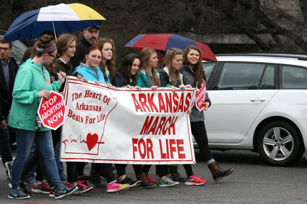 Young women lead the March for Life in Little Rock around the State Capitol. (Malea Hargett photo)