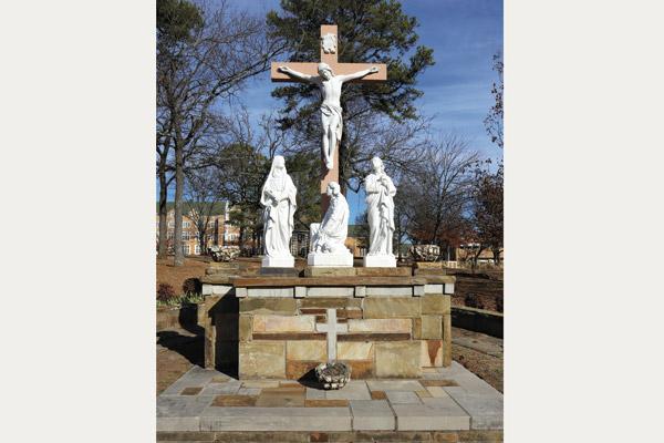 David Blount’s photo of a group of statues centered on a large crucifix in the cemetery at St. Scholastica monastery in Fort Smith tied for third place in the photo contest. 