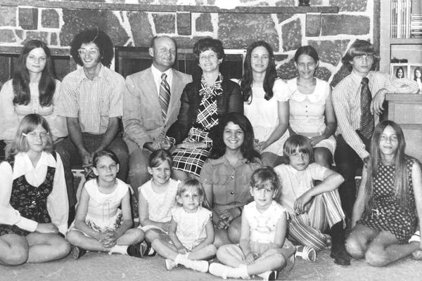 John and Lois Murray (back row center) hosted Patricia Henriquez (front row, fifth from left) from Chile in 1972. Henriquez stayed close to the family, particularly daughter Becky (back row, second from right). Other siblings include Ann (back row, from left), David, Lynn, Kelly, Jill (front row, from left), Elaine, Amy, Dana, Shannon, Chris and Beth. (Courtesy Brothers family)

