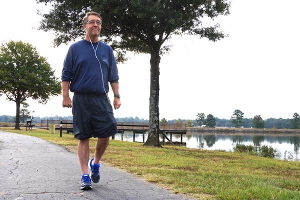 Ben Baldwin, a member of Our Lady of the Holy Souls Church in Little Rock, enjoys a trail near his Maumelle home just a month after receiving a kidney from his brother Deacon Bud Baldwin of Fayetteville. (Aprille Hanson photo)