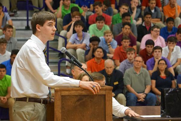 Thomas DePrez, 18, spoke to the student body to “open your heart to God” when discerning a vocation. (Aprille Hanson)