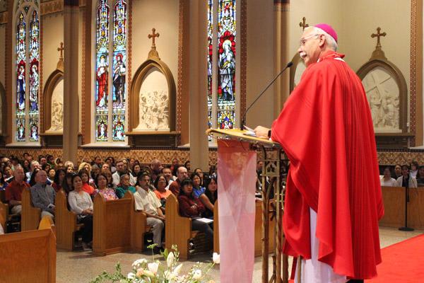 Bishop Anthony B. Taylor delivers his homily Sept. 16 before a packed Cathedral of St. Andrew in Little Rock. The bishop celebrated Mass honoring Fili-pino martyrs San Lorenzo Ruiz and San Pedro Calungsod. (Dwain Hebda photo)