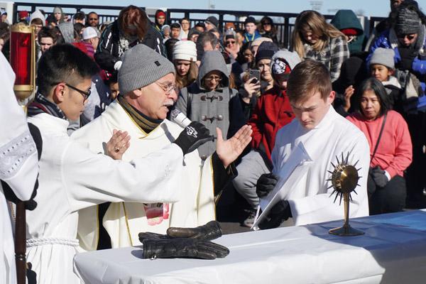Bishop Taylor leads prayers at the first station during the Eucharistic Procession for Life in downtown Little Rock. Seven stations were hosted by various groups within the diocese. (Malea Hargett photo)