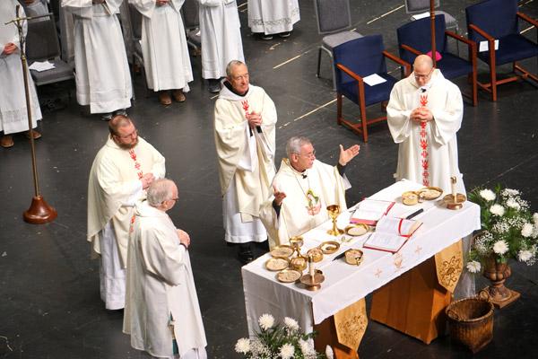 Bishop celebrated the Mass for life with assistance from Father Keith Higginbotham of Little Rock and Father Mark Stengel, OSB, of Subiaco and Dea-cons John Hartnedy of North Little Rock (left) and Danny Hartnedy of Little Rock. (Malea Hargett photo)