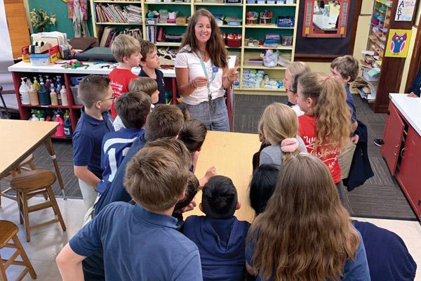 Tedie Cole leads an art lesson at Immaculate Conception School in Fort Smith. Cole uses art therapy to give students a way to communicate their feelings and work through any difficulties they are experiencing. (Photo courtesy Tedie Cole; prints not available)