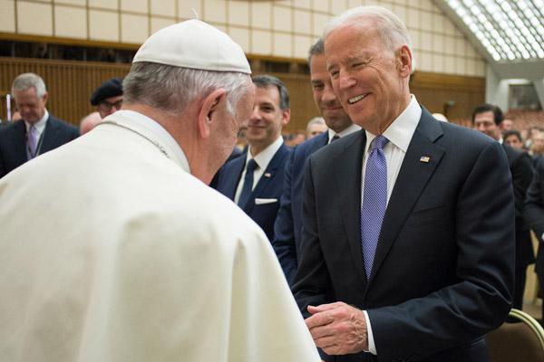 Pope Francis greets U.S. Vice President Joe Biden after both spoke at a conference on adult stem cell research at the Vatican in this April 29, 2016, file photo. Biden is the second Catholic in the country’s history to be elected to the nation’s highest office. (CNS file photo / L’Osservatore Romano)