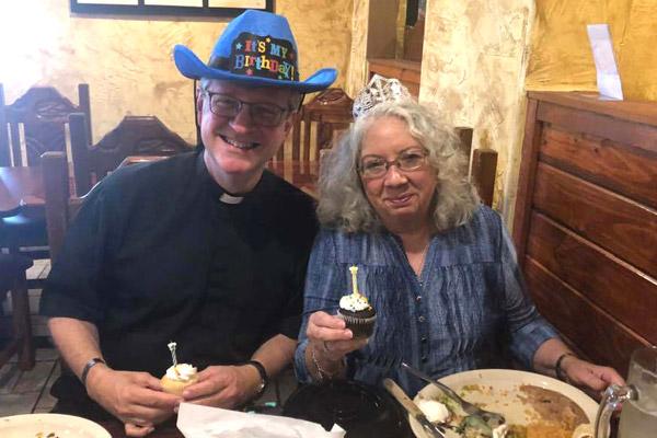 Father James West smiles with Victoria Shelton at their birthday lunch Aug. 27, 2019, at Chilango’s Mexican Restaurant in Texarkana, Texas. The two would often celebrate their September birthdays with lunch together. (Courtesy Victoria Shelton)