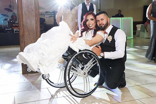 Ruby Varela smiles with her husband Sergio Torres after their June 12 wedding at St. Theresa Church in Little Rock. In 2007, the couple was involved in a car accident that left her a T-12 paraplegic. (Laura Gutierrez, D’Iván Photo & Video)