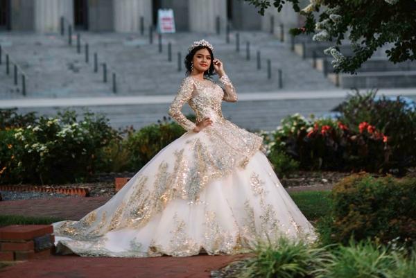 Ivela Garcia, a sophomore at Mount St. Mary Academy in Little Rock, poses in front of the Robinson Center in downtown Little Rock before her quinceañera, a Mass and party to celebrate her transition from adolescence into young adulthood, held July 10 at St. Mary Church Church in North Little Rock. (Photo Yaz Jimenez/Jimenez Imagery)