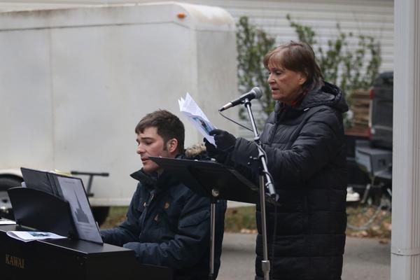 Pianist Beau Baldwin and cantor Alisa Dixon sing at the entrance song at All Souls Mass at Calvary Cemetery in Little Rock Nov. 2. (Photo Chris Price)
