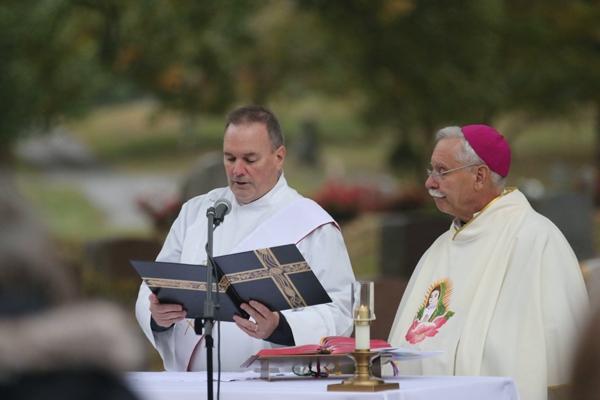 Deacon Tim Costello (left) and Bishop Anthony B. Taylor celebrate the All Souls Mass at Calvary Cemetery in Little Rock Nov. 2. (Photo Chris Price)