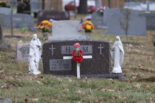 A gravesite decorated for All Souls Mass at Calvary Cemetery in Little Rock Nov. 2. (Photo Chris Price)