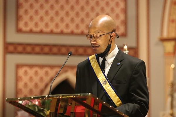 Knight of Peter Claver Verdell Bunting, Jr. announces Claudette Votor as the winner of the 2022 Daniel Rudd Award at the 35th Annual Dr. Martin Luther King Jr. Memorial Mass at the Cathedral of St. Andrew, Saturday, Jan. 15. (Chris Price photo)