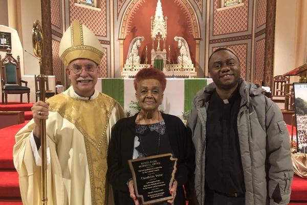 Bishop Anthony B. Taylor; Claudette Votor, winner of the 2022 Daniel Rudd Award and a member of St. Augustine Catholic Church in North Little Rock; and Father Leon W. Ngandu, SVD, pastor of St. Augustine Church in North Little Rock and St. Bartholomew Church in Little Rock, at the 35th Annual Dr. Martin Luther King Jr. Memorial Mass at the Cathedral of St. Andrew, Saturday, Jan. 15. (Chris Price photo)