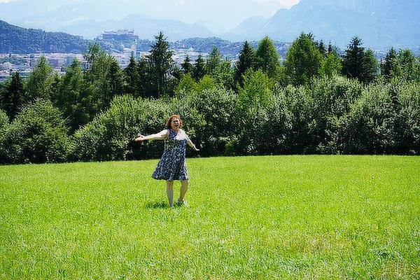 Alongside the hilltop shrine of Maria Plain overlooking Salzburg, Austria, July 3, Elizabeth Reha of Little Rock (photo below) channels Julie Andrews’ iconic character Maria from “The Sound of Music.”