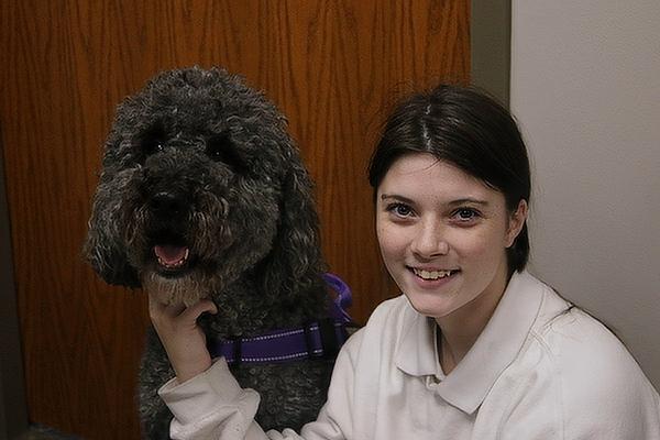 Senior Lilli Brooks used spare time in her lunch break to visit Oliver, the therapy dog, the counselors’ office at Mount St. Mary Academy in Little Rock, Aug. 31.