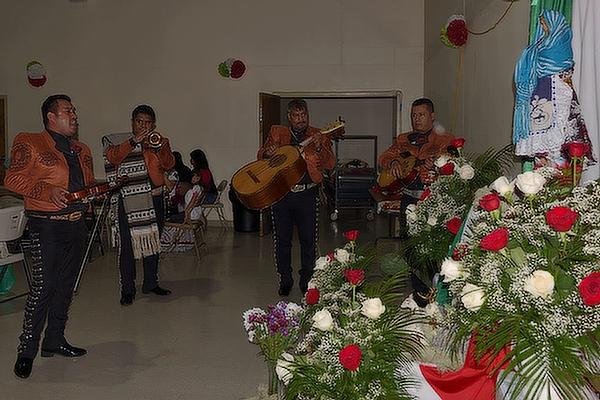 A mariachi band serenades Our Lady of Guadalupe at St. Luke Church's celebration in Warren Dec. 10. (Courtesy St. Luke Church)