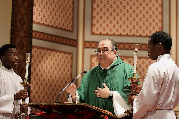 Deacon Marc Rios gave the gospel reading at the 36th Annual Dr. Martin Luther King Jr. Memorial Mass at the Cathedral of St. Andrew Jan. 14. (Chris Price photo)