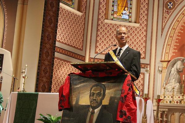 Verdell Bunting Jr., president of the DCBC and member of St. Bartholomew Church in Little Rock, announced Arthur Martin as the winner of the 2023 Daniel Rudd Award at the 36th Annual Dr. Martin Luther King Jr. Memorial Mass at the Cathedral of St. Andrew, Saturday, Jan. 14. (Chris Price photo)
