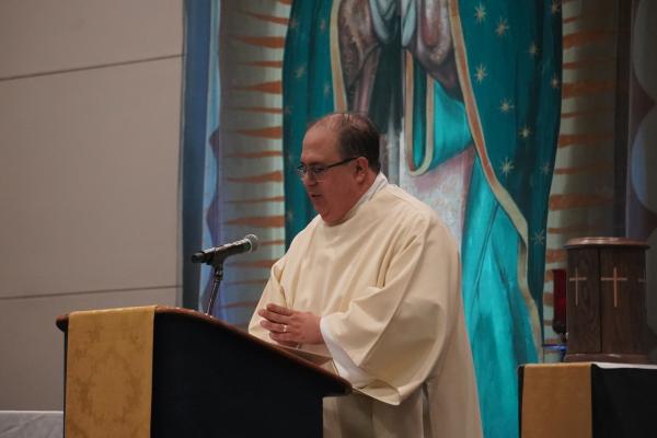 Deacon Marc Rios, of the Cathedral of St. Andrew in Little Rock, gave the Gospel reading in Spanish then English during the annual Mass for Life in the Wally Allen Ballroom at the Statehouse Convention Center in Little Rock Jan. 22. (Malea Hargett photo)