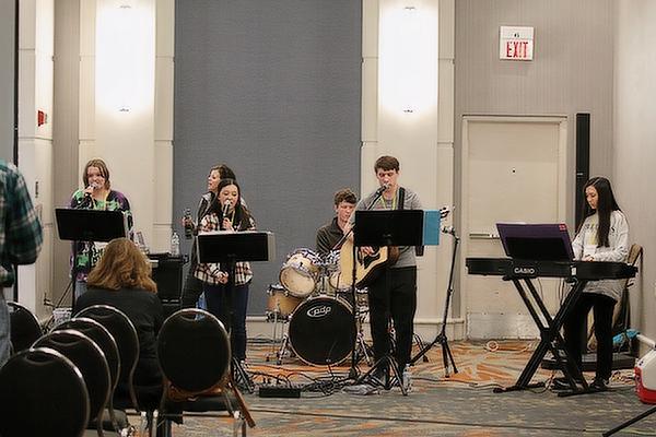 Members of Team Jesus, a teen band based at Christ the King Church in Little Rock, provided music before the keynote speaker at the the Weekend for Life Jan 21, the night before the annual eucharistic procession, Mass and March for Life in Little Rock. (Chris Price photo)