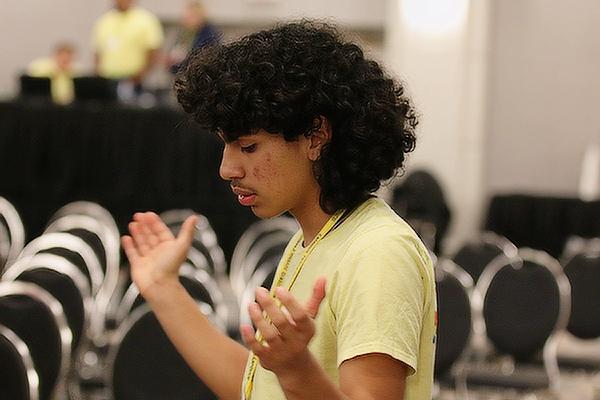 Youth Advisory Council member Ismael “Izzy” Contreras, a member of Our Lady of Good Counsel in Little Rock, prays during the opening of the diocese’s Weekend for Life Jan 2, the night before the annual eucharistic procession, Mass and March for Life in Little Rock. (Chris Price photo)