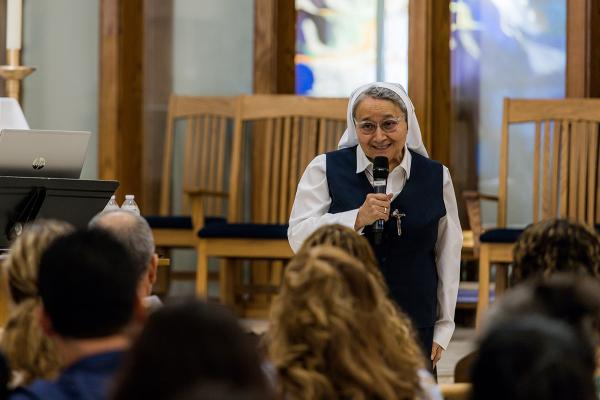 Sister Mickey Espinoza, MCP, diocesan director of Hispanic ministry, delivers the keynote speech about eucharistic miracles to the Spanish-speaking participants June 3. (Travis McAfee photo)