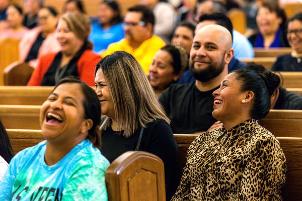 Parishioners enjoy Father Omar Galvan’s breakout session presentation. (Travis McAfee photo)