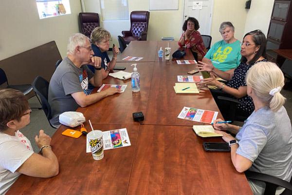 Immigration attorneys (right) from Las Americas Immigrant Advocacy Center in El Paso speak to Pax Christi members about immigration June 24. (Courtesy Pax Christi Little Rock) 