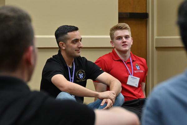 Seminarians Sam Stengel (left) of Paris and Jackson Nichols (right) of Pocahontas lead a discussion with their small group July 11. (Collin Gallimore photo)