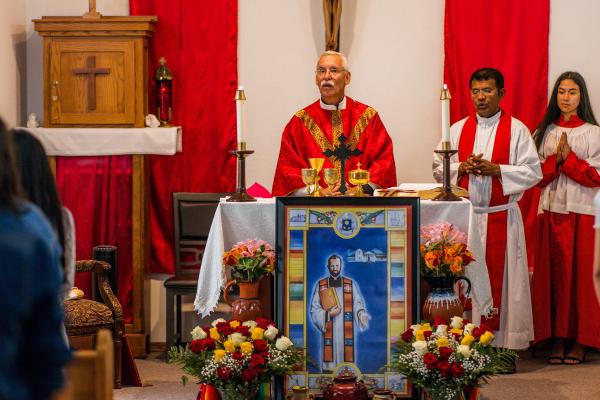 Bishop Anthony B. Taylor celebrates the confirmation Mass July 29 at Blessed Stanley Rother Church in Decatur as pastor Father Arokiasamy “Samy” Madhichettyirudayaraj and altar server Jasmin Gomez look on. Travis McAfee.