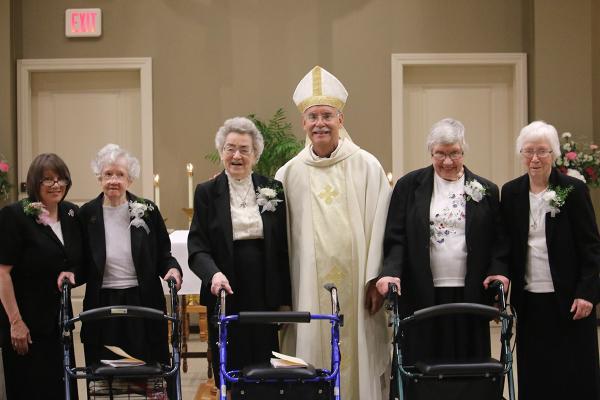 Bishop Anthony B. Taylor celebrates a jubilarian Mass July 8 at St. Scholastica Monastery in Fort Smith with prioress Sister Kimberly Prohaska (left) and jubilarians Sister Leona Marie Selig, Sister Adrian Wewers, Sister Elise Forst and Sister Maria Goretti DeAngeli. Courtesy St. Scholastica Monastery.