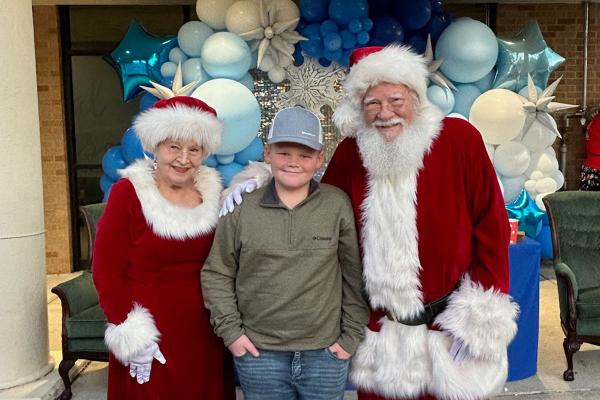 While donating his toys to Arkansas Children’s Hospital, Eli Paladino got to visit with two unlikely guests — Santa and Mrs. Claus. 