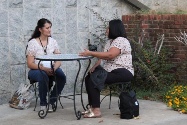 Spiritual direction students Lupita Alvarez (left) and Yolanda Berumen 
chat during a break between classes for the School of Spiritual Direction 
Sept. 15, 2023, at St. John Center in Little Rock. File photos/Katie Zakrzewski.