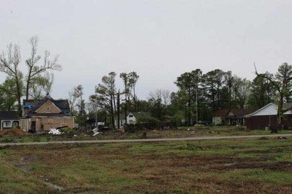 Remnants of houses, fencing and trees cover a neighborhood in Wynne a year after being hit by an EF3 tornado. Residents are grappling with insurance and housing shortages as they recover. Photo taken April 11, 2024. (Katie Zakrzewski)