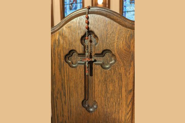 Honorable mention: A rosary hangs on the end of a pew at Blessed Sacrament Church, by Tony Brodell of Jonesboro.